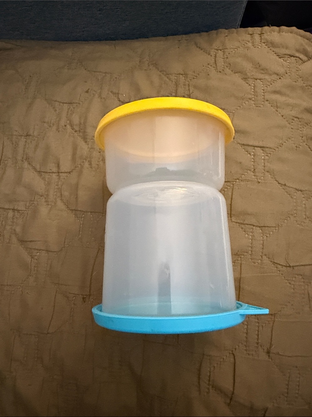 Hourglass pickle and olive jar with a built-in juice strainer.